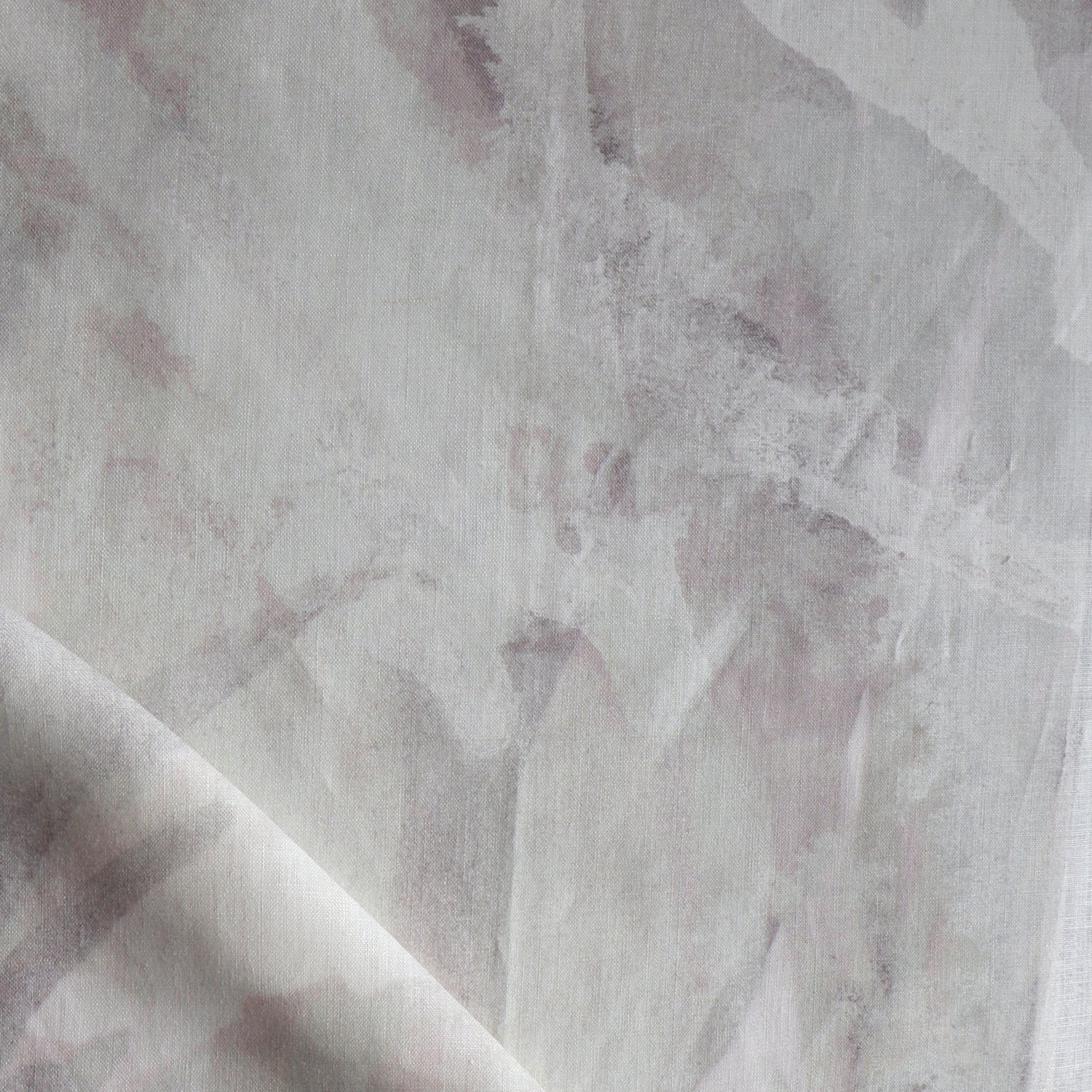 Close-up of a textured fabric with a subtle pattern