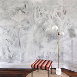 Room interior with abstract white wall design, striped stool, and floor lamp.