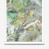 Wallpaper roll  with a green and white leaf pattern
