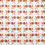Printed linen in a small scale watercolor floral in orange and purple.