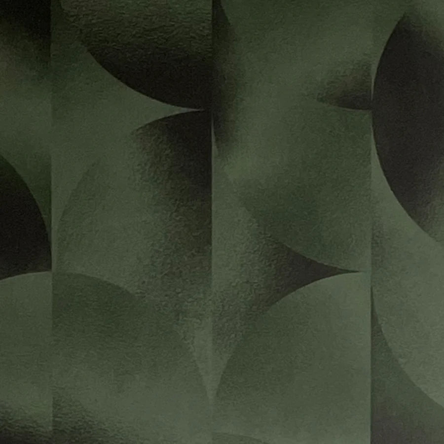 Detail of wallpaper in an abstract curvilinear print in mottled green and black.