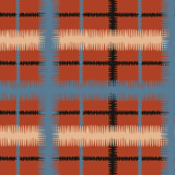 Detail of fabric in a squiggly check pattern in blue, cream and black on a red field.