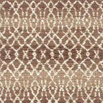 Handmade flatweave rug in a white lattice on a ombre brown ground 