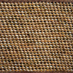 Textural flatweave rug in a strié twill weave in shades of brown, tan and cream.
