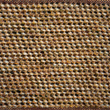Textural flatweave rug in a strié twill weave in shades of brown, tan and cream.