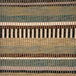 Textural flatweave rug in a varigated stripe design in brown, teal, green and cream.