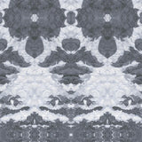 Detail of wallpaper in a painterly ikat print in shades of gray and light blue.