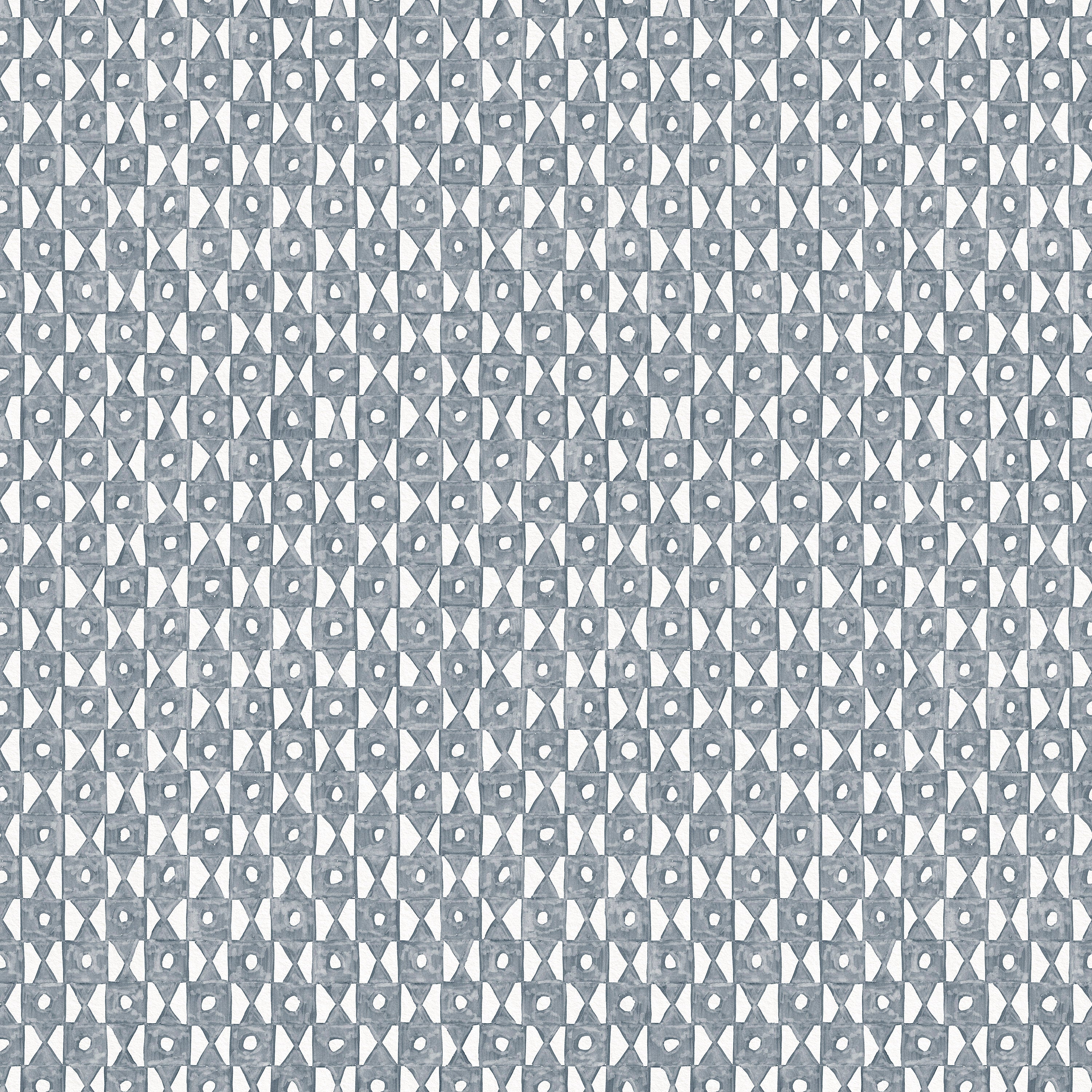 Detail of fabric in a geometric grid print in navy on a white field.