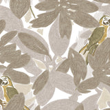 Detail of wallpaper in a playful botanical and parrot print in shades of gray, brown and yellow on a white field.