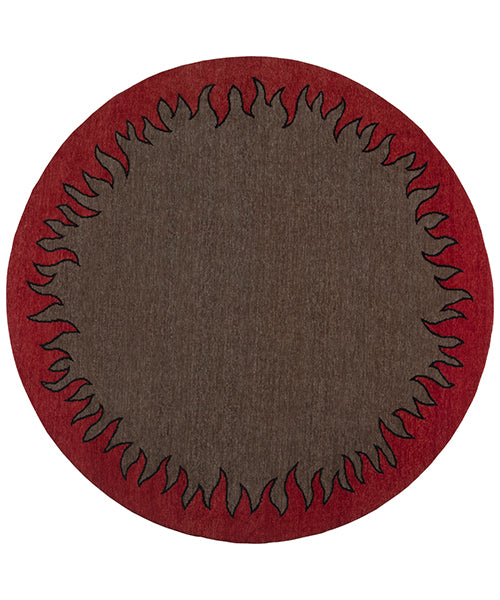 Handknotted circular rug with a flame border design in red on a brown field. 