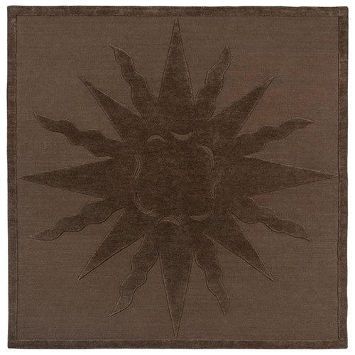 Handknotted rug with a raised sun motif in tonal brown with a thin border.