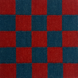 Flatwoven checkerboard rug in blue and red.