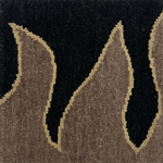 Detail of a handknotted rug with a flame border design in brown on a black field. 