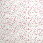 Wallpaper in a minimal floral print in navy and pink on a cream field.