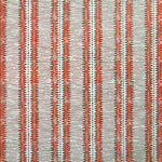 Detail of wallpaper in a dense tribal stripe pattern in shades of cream, red and brown.
