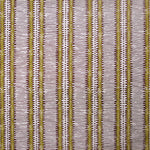 Detail of wallpaper in a dense tribal stripe pattern in shades of cream, mustard and brown.