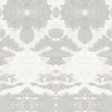 Detail of wallpaper in a painterly ikat print in shades of gray and cream.