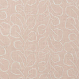 Woven fabric swatch with a large-scale repeating leaf print in white on a light pink background.