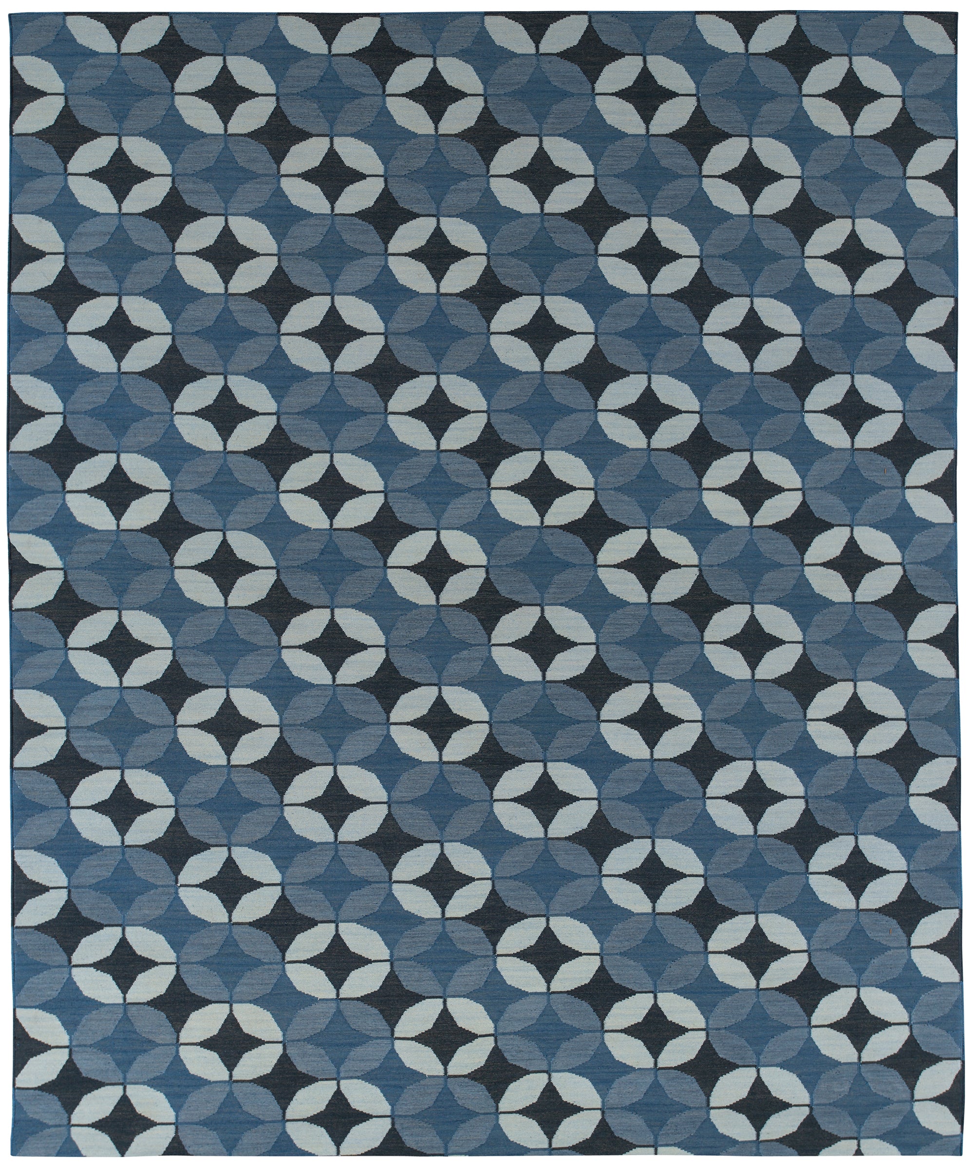 Full size Alhambra Rug featuring a pattern of linked circles that create a star like lattice in a range of blue shades, from pale blue to chambray, indigo, to dark navy