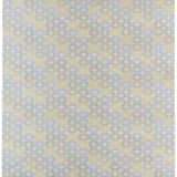 Detail of Alhambra Rug in Mint featuring a pattern of linked circles that create a star like lattice in a range of pastel turquoise, mint, yellow and lime green on a soft beige field. 