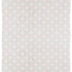 Full size Alhambra Rug in Stonewash featuring pattern of linked circles that create a star like lattice in a range of pale pink tones a soft white field. 