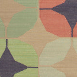 Detail of Alhambra Rug in Venetia featuring pattern of linked circles that create a star like lattice in a range of coral, mustard tyellow, seafoam green, pale green and royal purple accents on a tan field. 