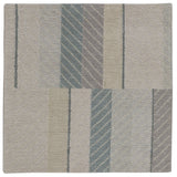 Detail of the Amelia Rug in Pearl featuring a minimalist broken stripe pattern, overlayed with thin white diagonal lines. The broken stripes are a mix of pale blues, grey, and turquoise with slate grey accents, all on a pale grey field. 