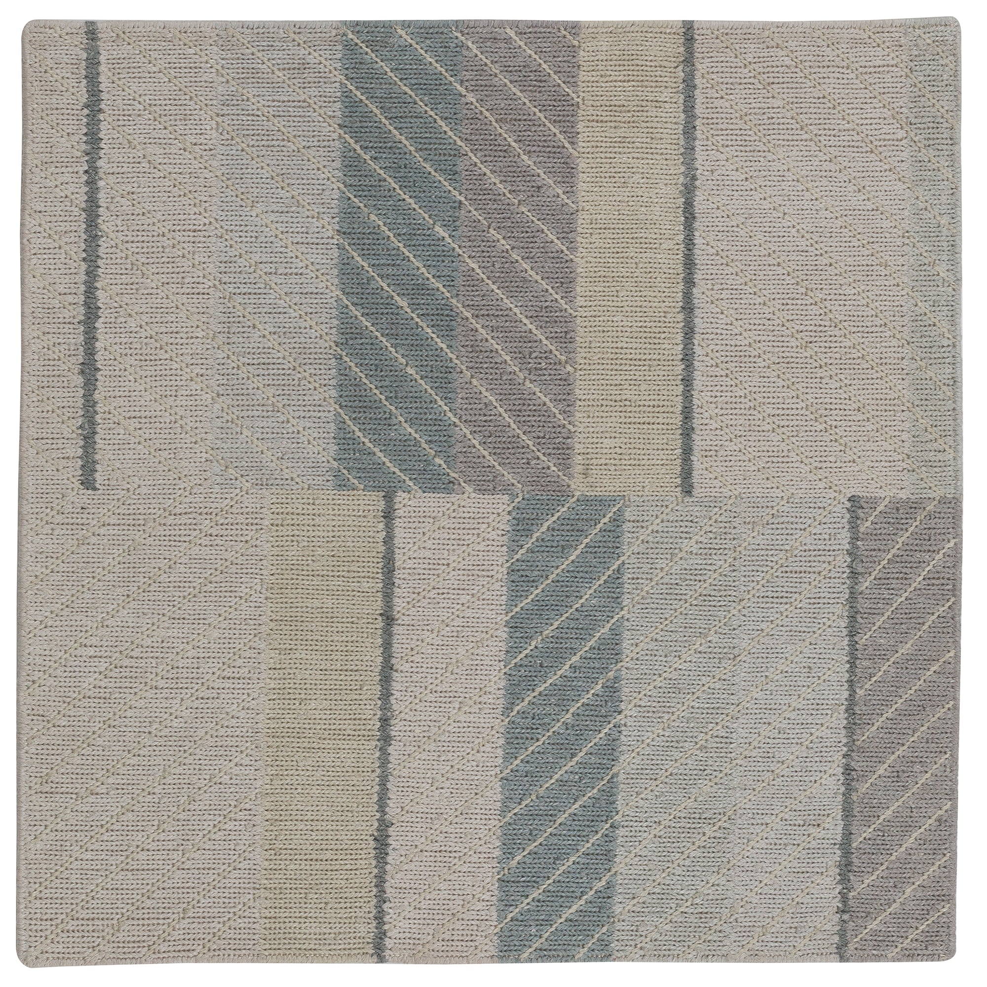 Detail of the Amelia Rug in Pearl featuring a minimalist broken stripe pattern, overlayed with thin white diagonal lines. The broken stripes are a mix of pale blues, grey, and turquoise with slate grey accents, all on a pale grey field. 