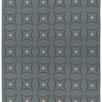 Full size Boe rug in Argento, featuring a pattern of curved segments in grey with white circles on a blue field. 