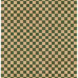 Detail of the Checkerboard Rug in Pawn, a green and tan checkered pattern. 