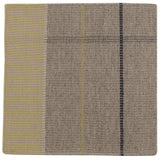 Detail of the Jasper Waffle Rug in Peridot, a large scale plaid pattern of ecru, yellow, grey and off white. 