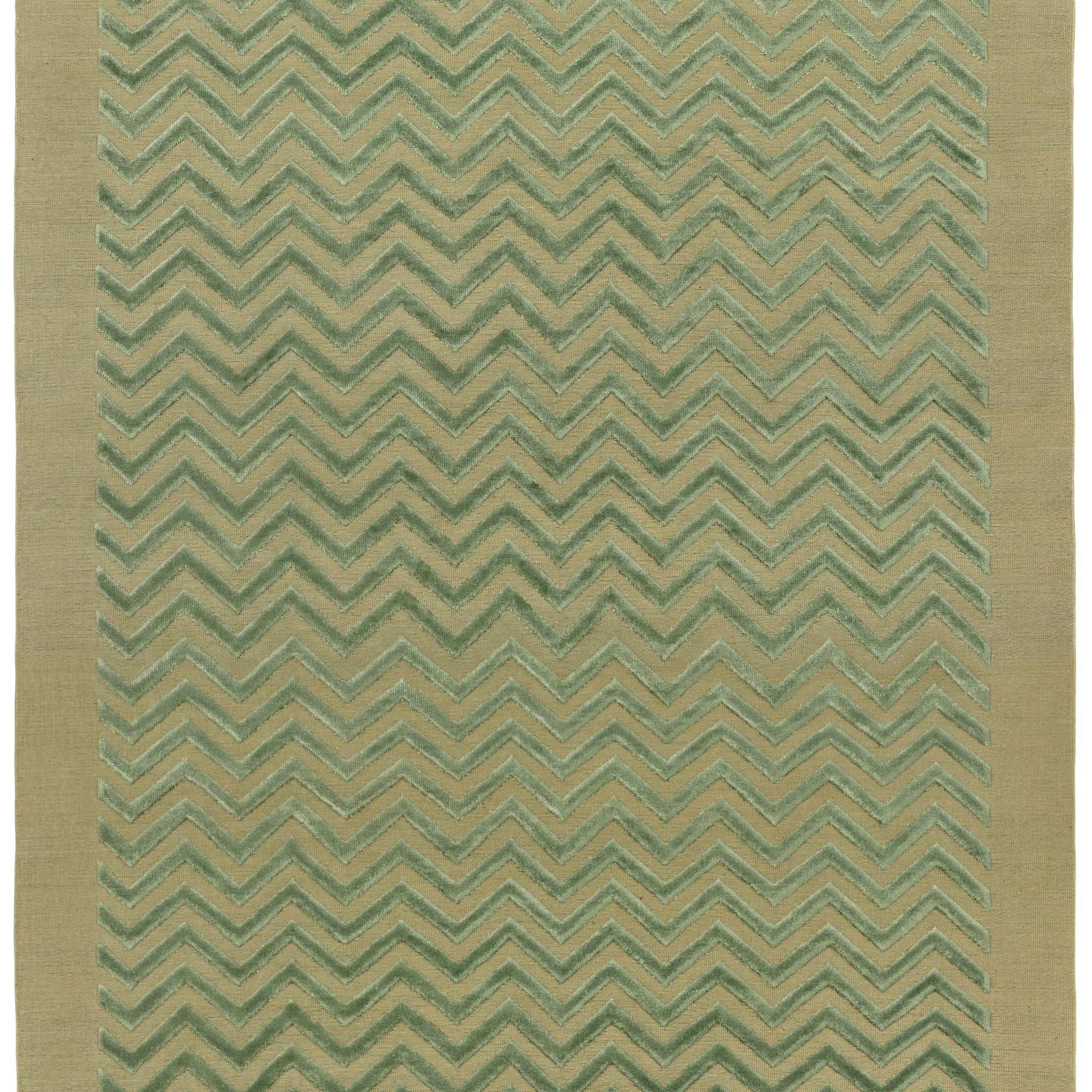Full size Penta Chevron Rug in Pale Jade a light green chevron pattern on a lime green  field with a wide solid border. 