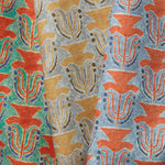 Trio of Petite Jaipir fabric swatches with a stamped painted floral motif in Malachite, Argent and Lapis