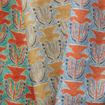 Trio of Petite Jaipir fabric swatches with a stamped painted floral motif in Malachite, Argent and Lapis