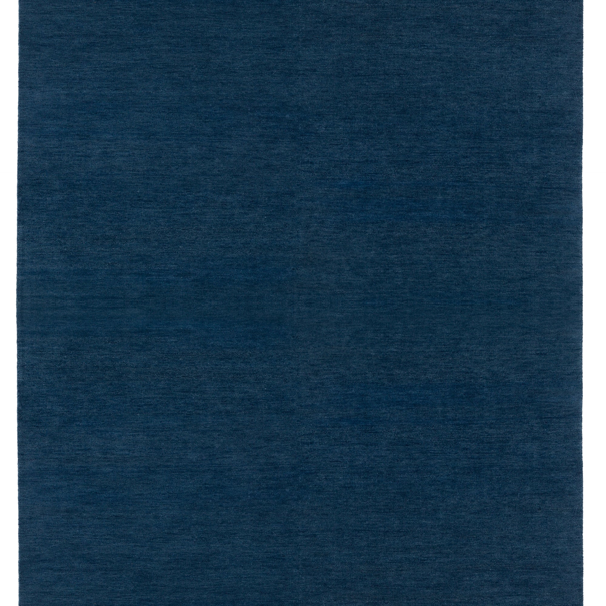 Full Size Plain Stitched Border Rug in Prussian Blue, a solid indigo rug with a black border with black border with blue and taupe dashes. 