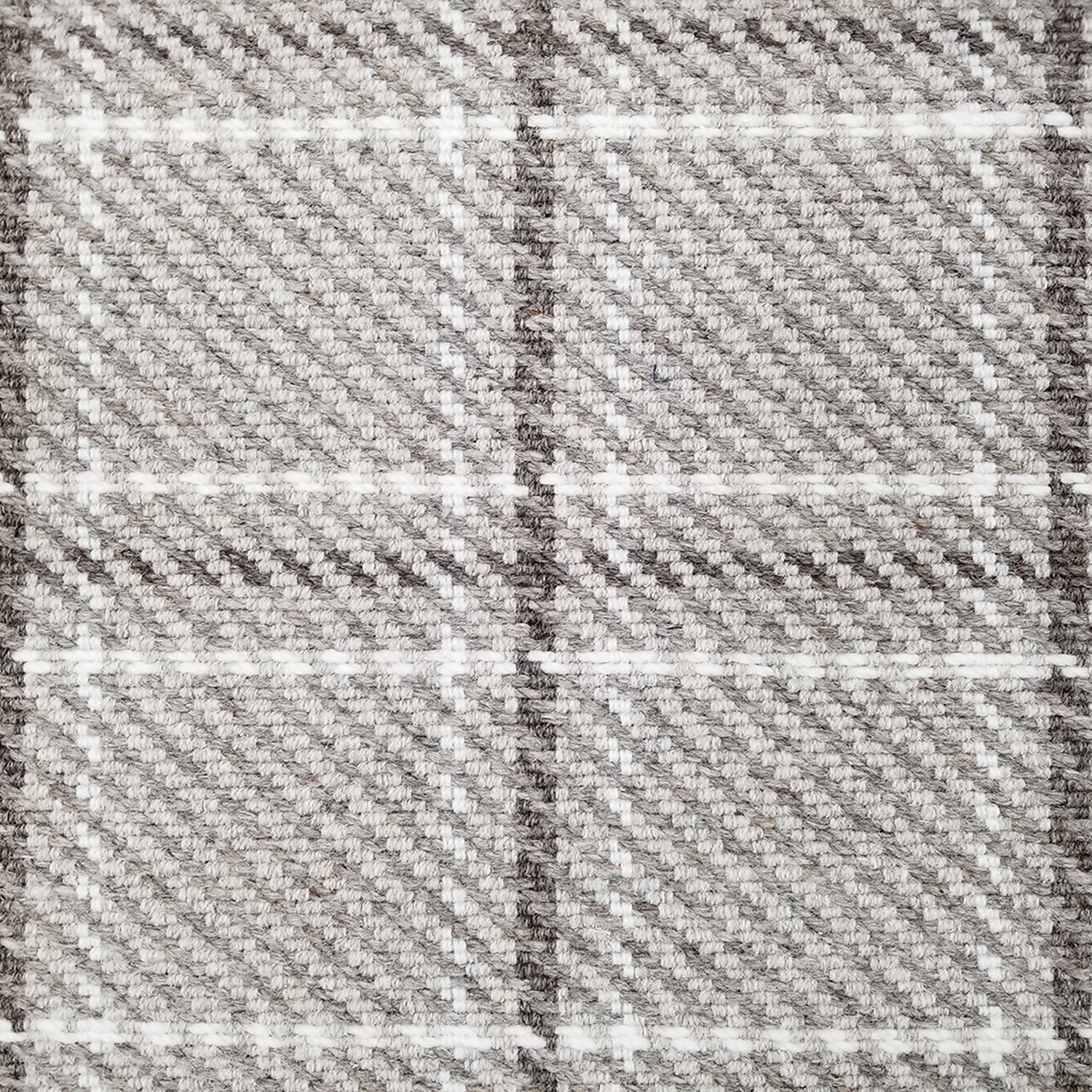Wool broadloom carpet swatch in houndstooth plaid in shades of gray and white.