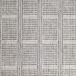 Wool broadloom carpet swatch in a plaid print in shades of gray and white.