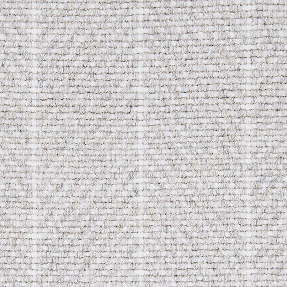 Wool broadloom carpet swatch in a woven chevron pattern in light gray and white with white accent stripes.