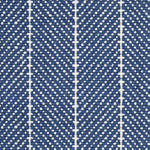 Wool broadloom carpet swatch in a herringbone stripe in navy and white.