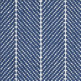 Wool broadloom carpet swatch in a herringbone stripe in navy and white.