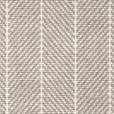 Wool broadloom carpet swatch in a herringbone stripe in tan and cream.