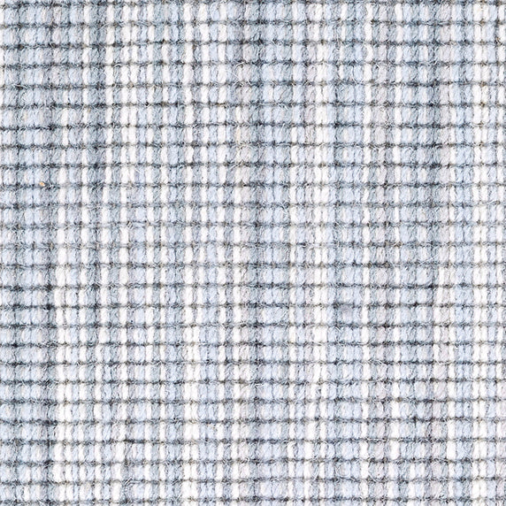 Wool broadloom carpet swatch in a multicolor stripe in shades of cream, light blue and gray.