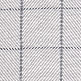 Outdoor broadloom carpet swatch in a plaid weave in shades of white, charcoal and gray.