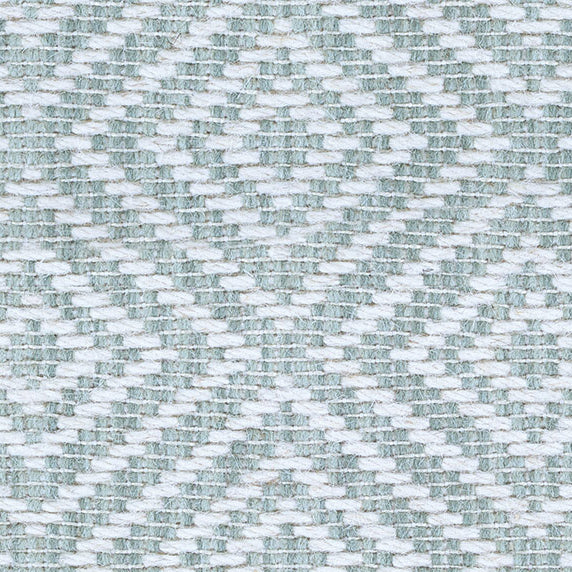 Wool broadloom carpet swatch in a woven geometric diamond print in teal and cream.