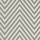 Outdoor broadloom carpet swatch in a herringbone weave in gray and cream.
