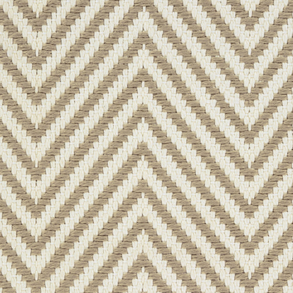 Outdoor broadloom carpet swatch in a herringbone weave in tan and cream.