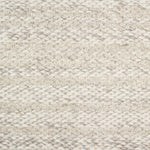 Wool broadloom carpet swatch in a textured stripe weave in cream.