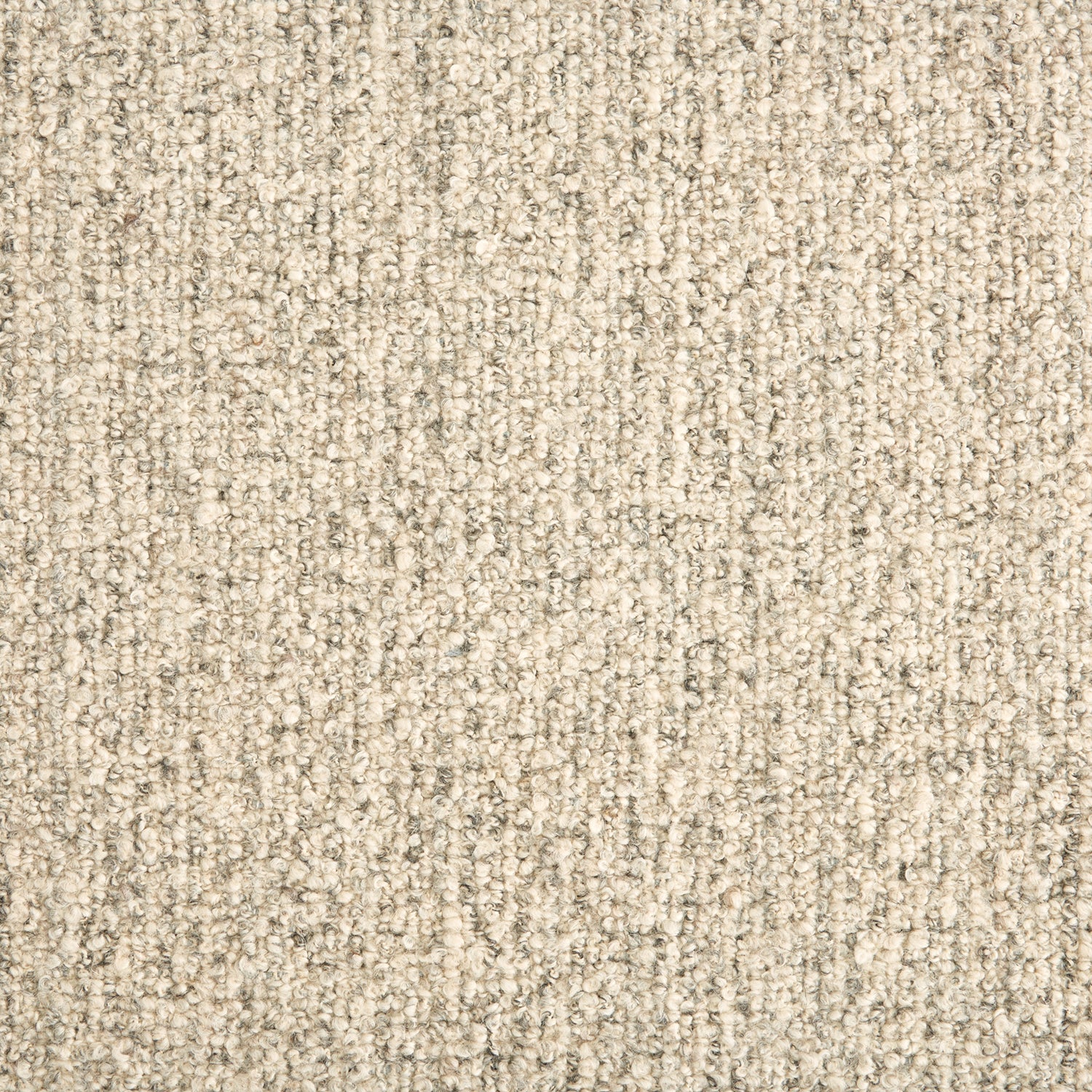Wool broadloom carpet swatch in a textured high-pile weave in mottled tan.