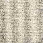 Wool broadloom carpet swatch in a textured high-pile weave in mottled tan and sage.
