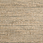 Jute broadloom carpet swatch in a flatweave in a natural shade.